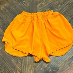 Offline by aerie orange shorts size‎ large